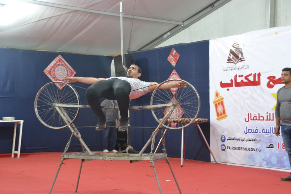 عرائس الماريونيت فى معرض فيصل للكتاب